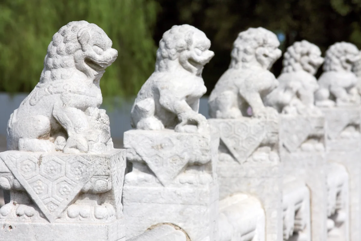 Marble foo dogs standing guard