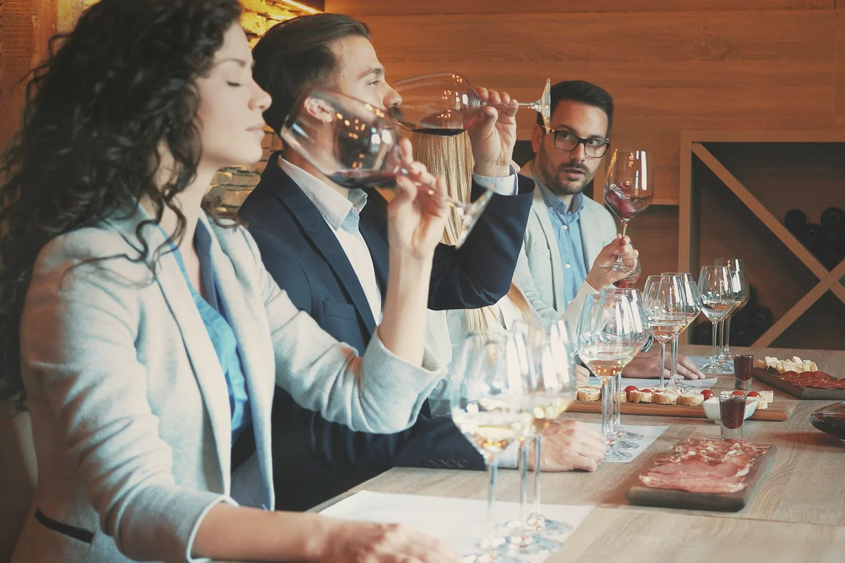 Friends tasting wine together