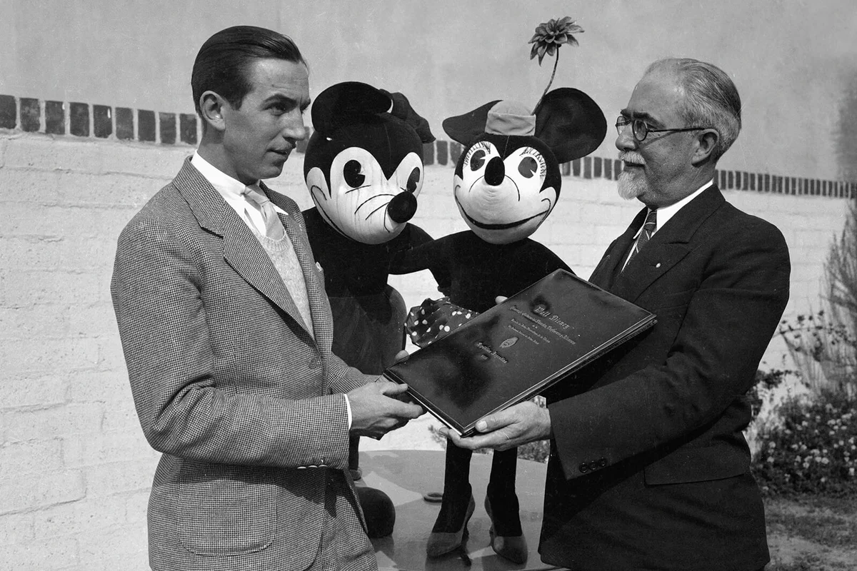 Mickey and Minnie Mouse Watching Their Creator Receive Diploma | Getty Editorial Use