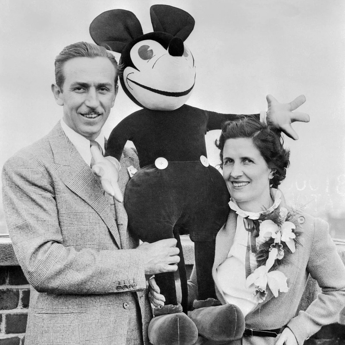 Walt and Mrs. Disney Standing with Stuffed Mickey Mouse | Getty Editorial Use
