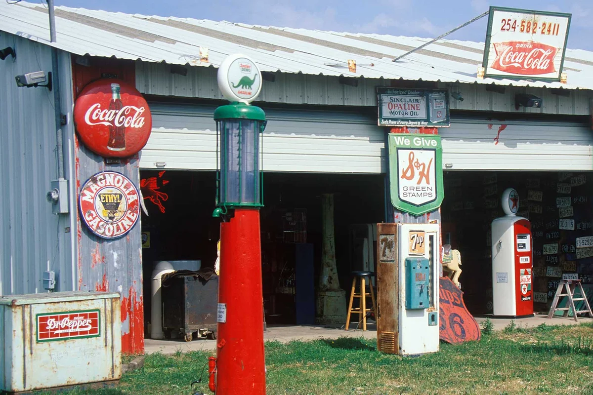 Antique gas station pumps and Coca-Cola signs in Texas
