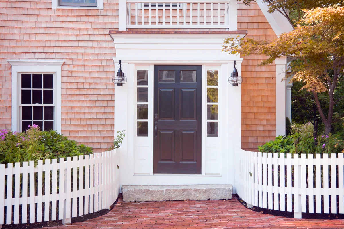 Entryway of brick New England home