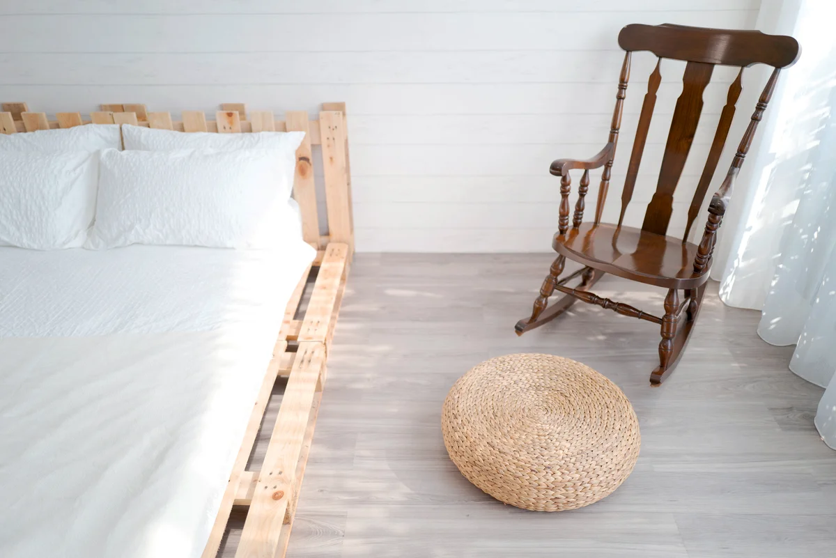 Interior decoration, farmhouse style, palette bed, rocking chair