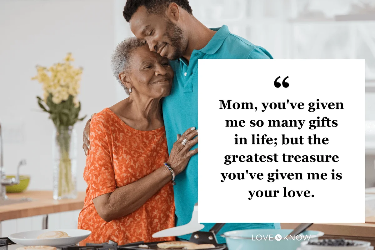Man hugging senior mother in kitchen