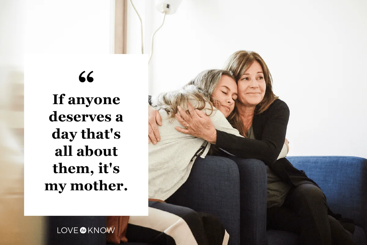 Mother and daughter embracing while sitting at wellness center
