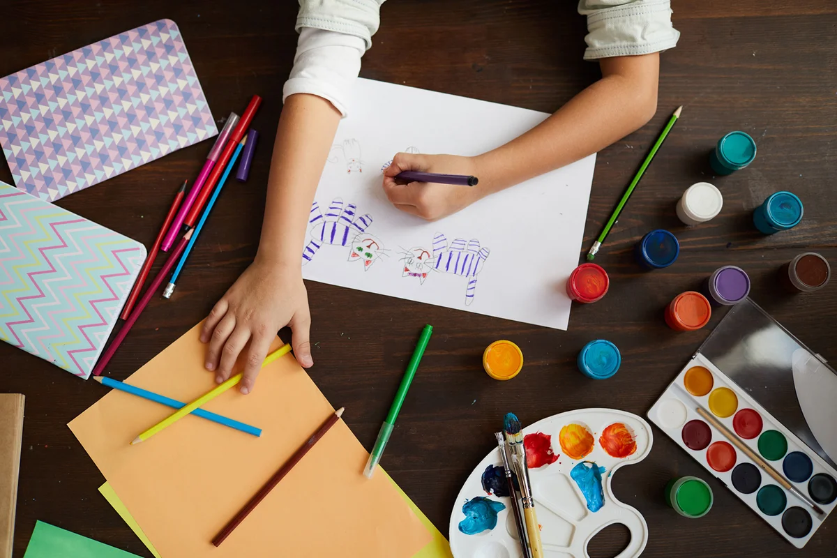 Child Drawing Cats