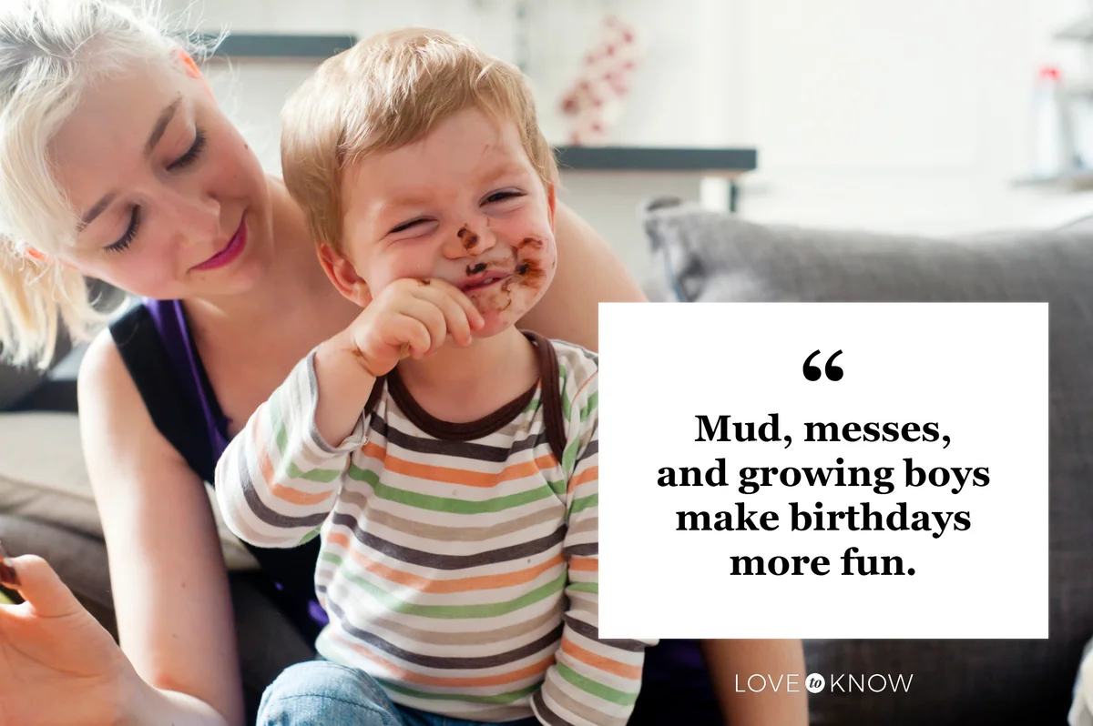mom having fun with messy young son