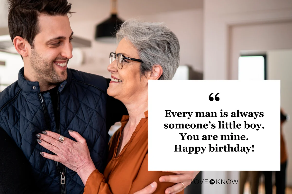 elderly mother getting hug from adult son