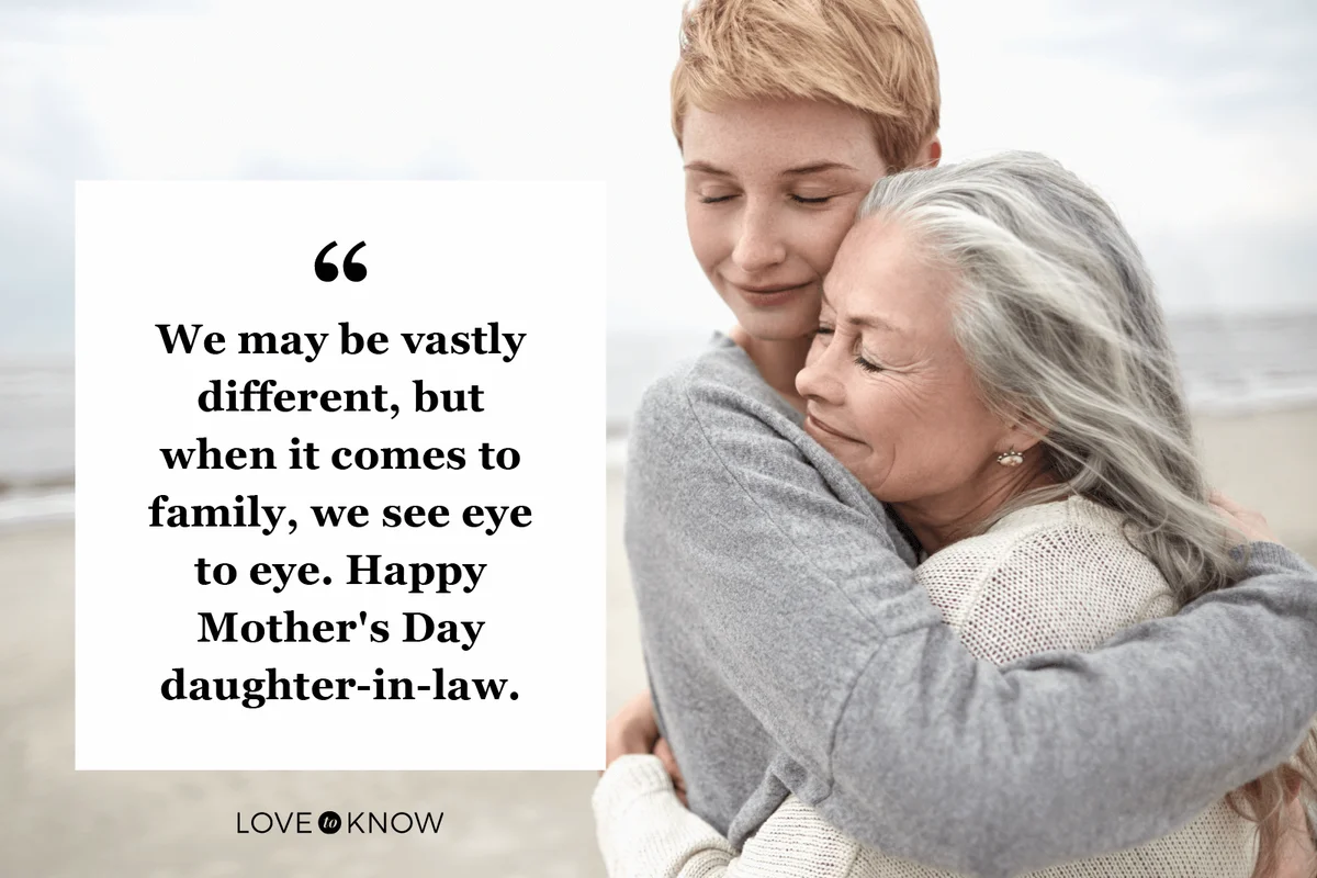 Daughter-in-law hugging senior mother on the beach