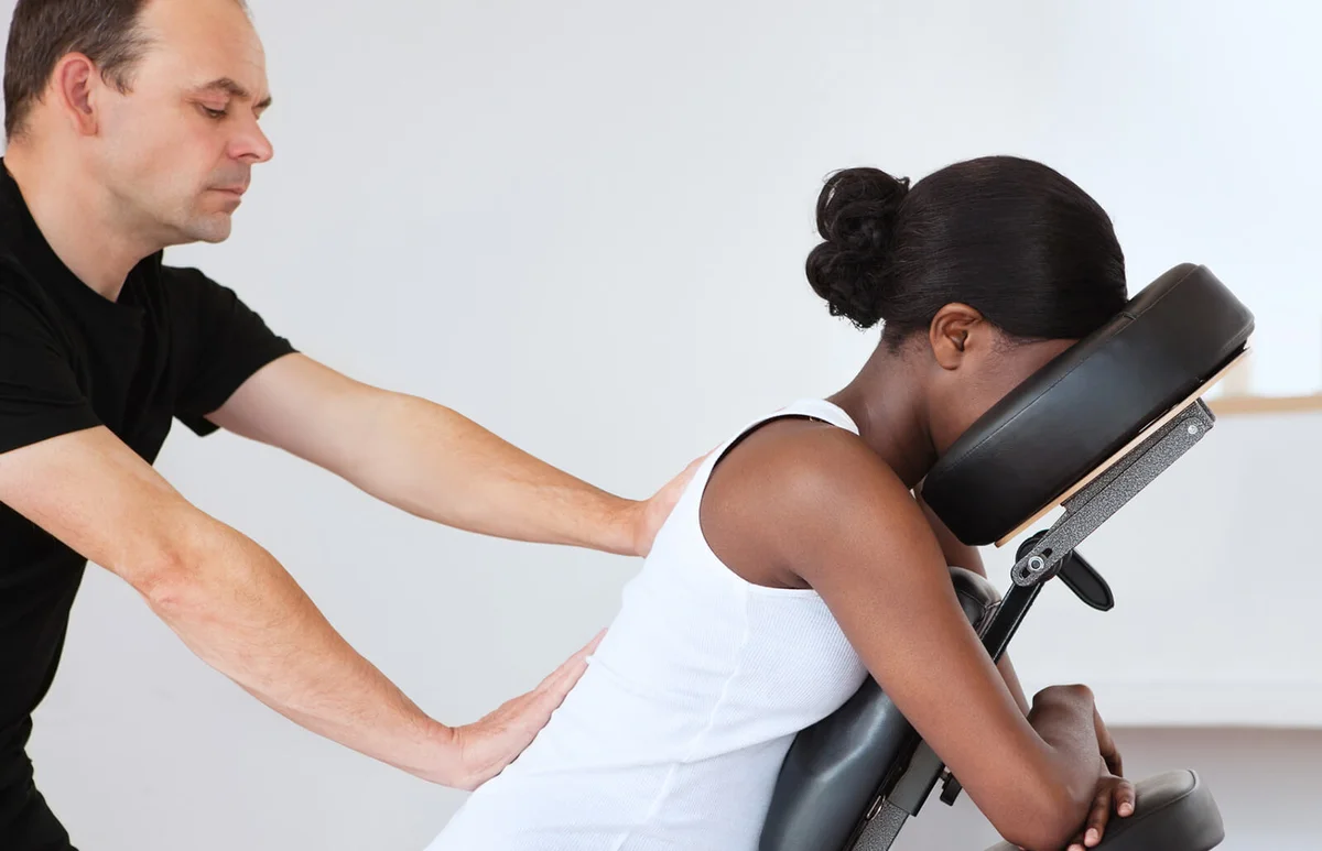Woman in a Head Massage Chair