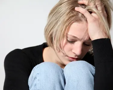 sad woman -- image under license from istock photo Image used under license from IstockPhoto