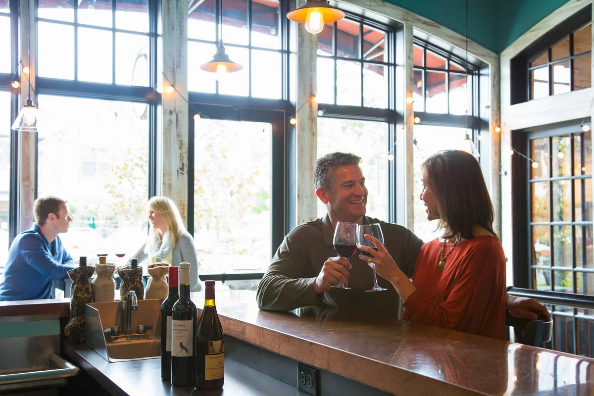 couples at a wine bar