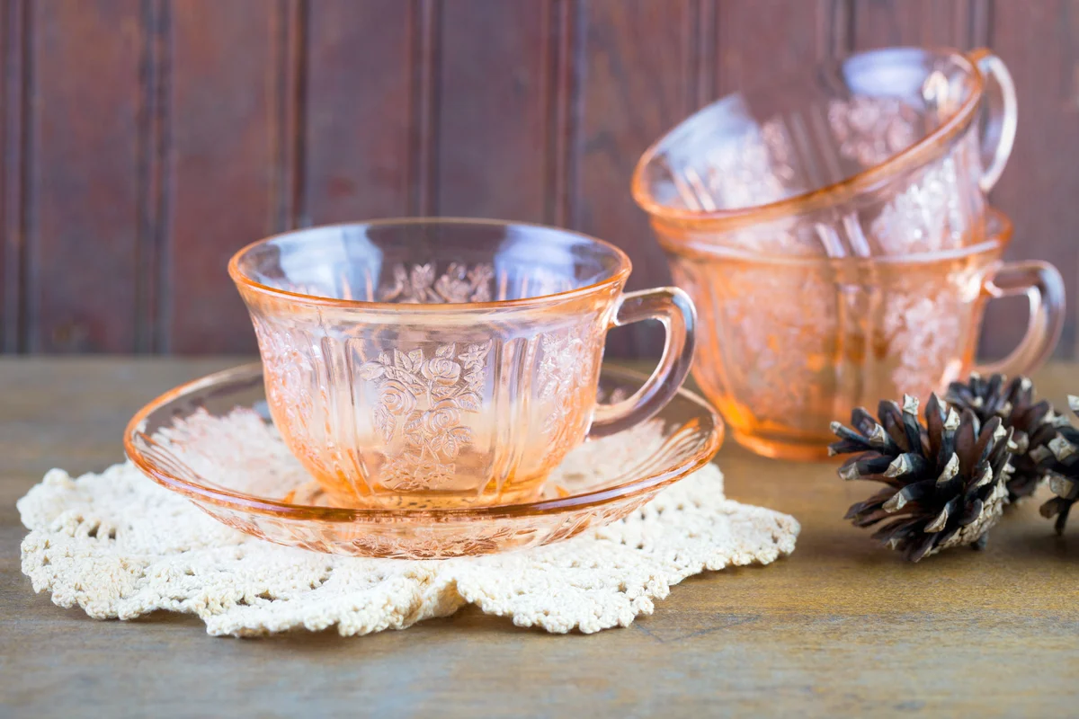 Pink depression glass coffee cups and saucer