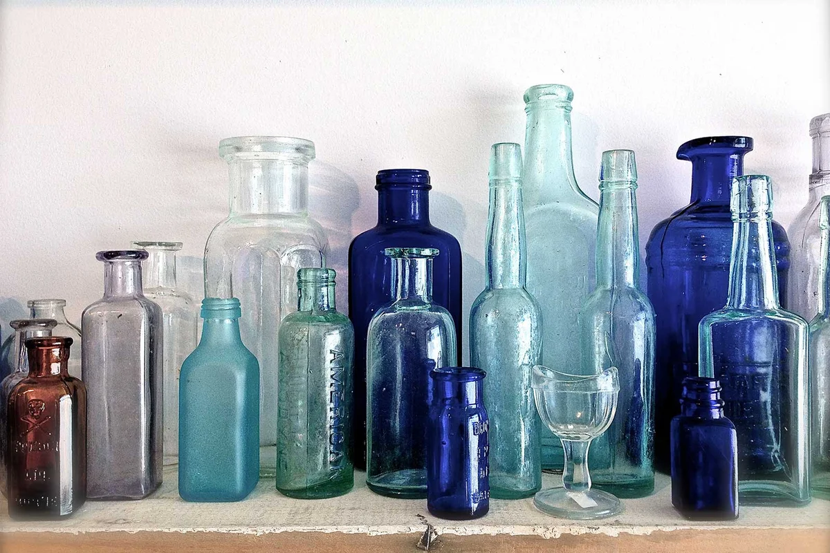 blue bottles on shelf
