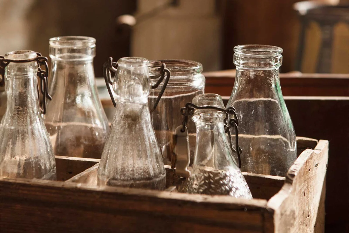 antique bottles in crate