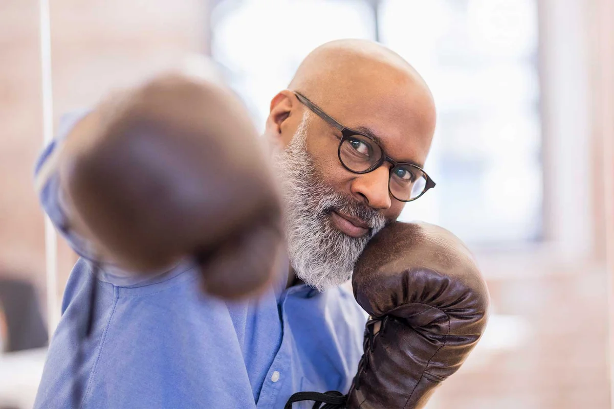 business man with boxing gloves