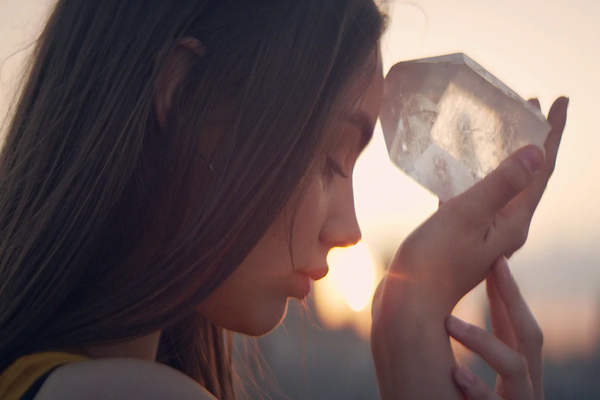 Woman using crystal for healing