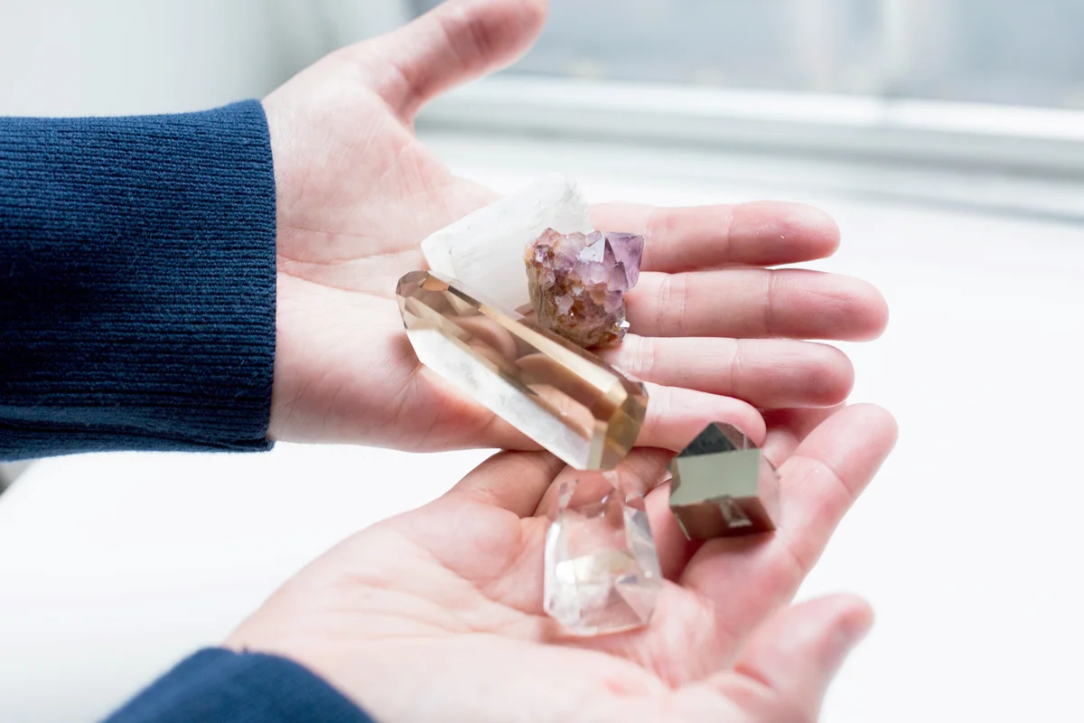 Man holding crystals