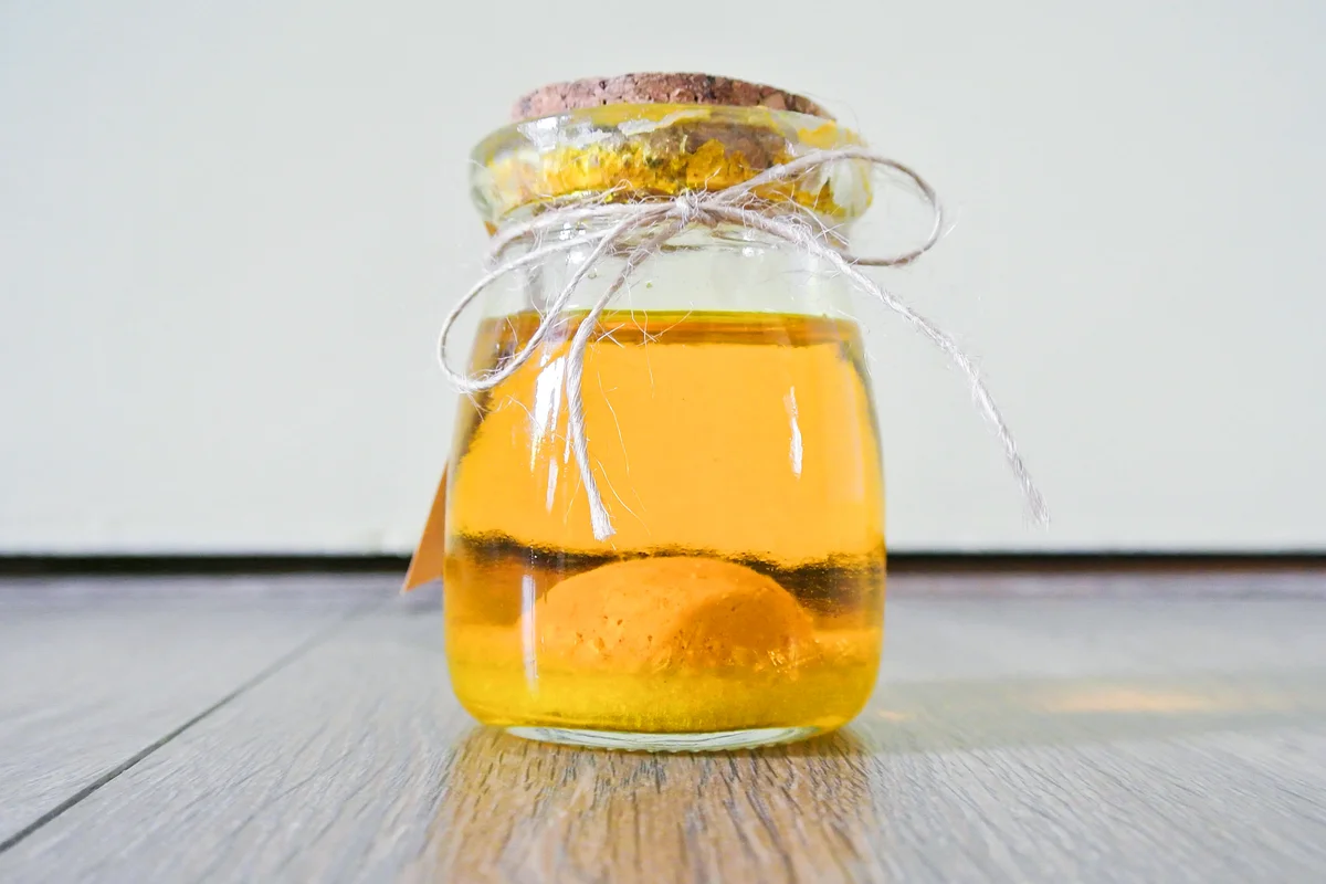 Orange With Gin In Glass Jar