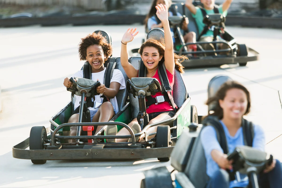 Teenage girls on go cart