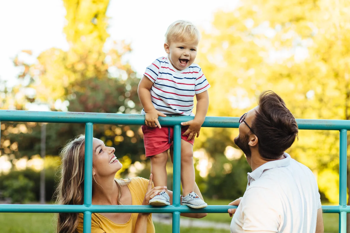 father with son at playground