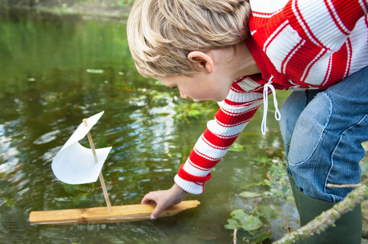 homemade toy boat on the lake
