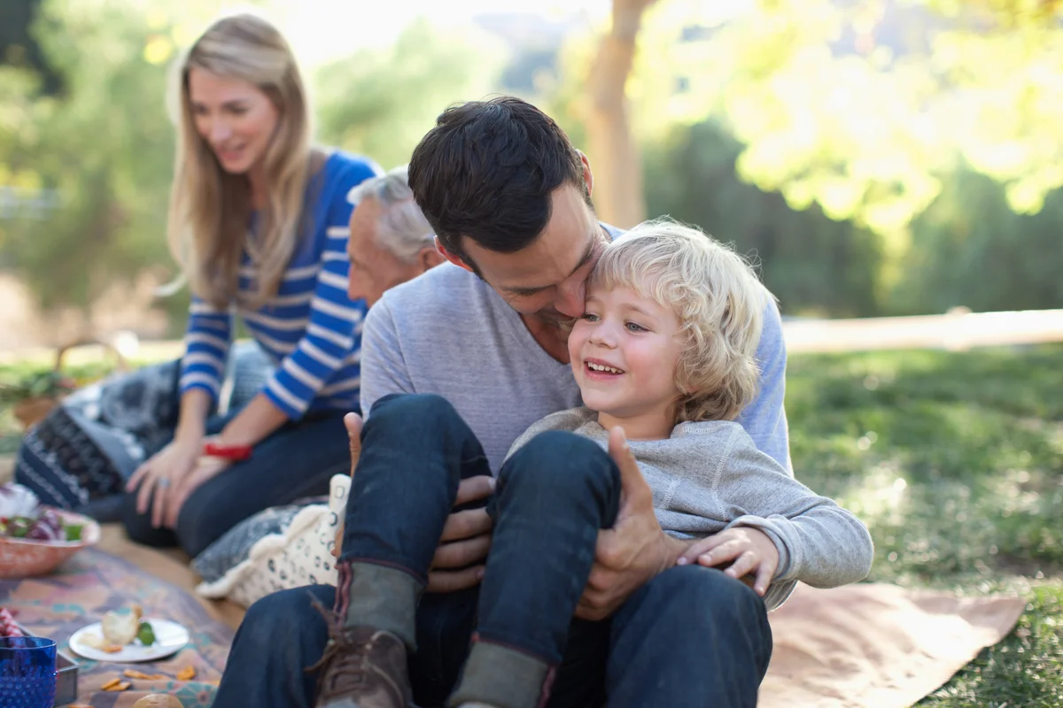 family fathers day picnic in the park