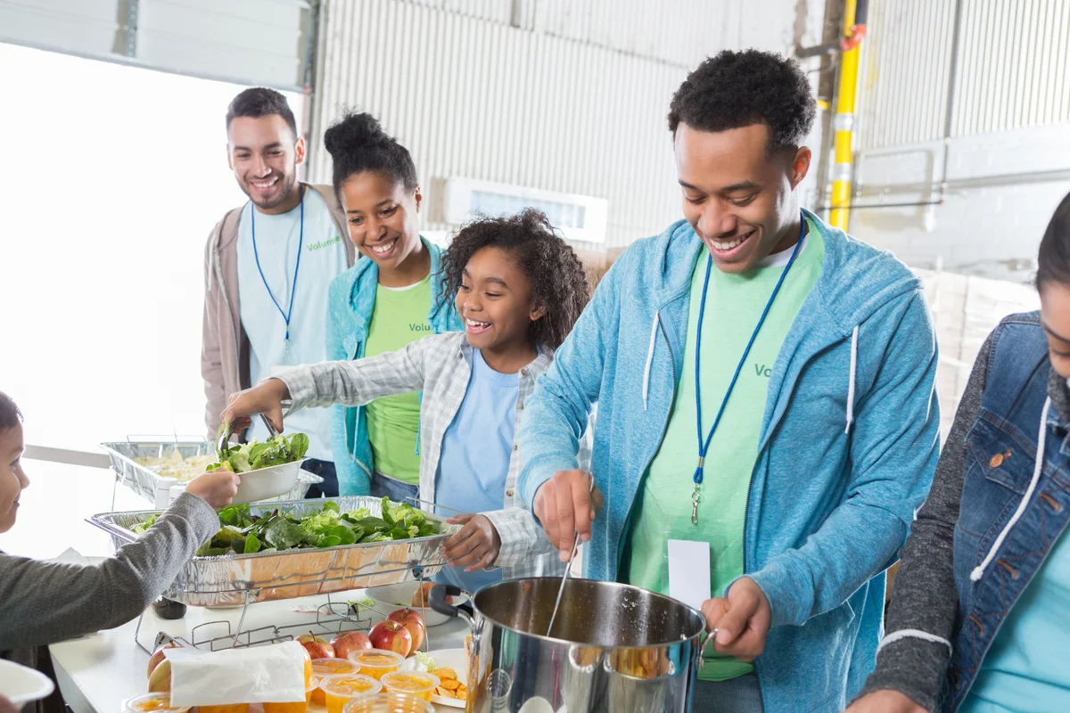 father day volunteer serving food