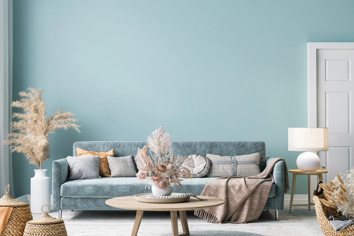Monochromatic interior with green sofa in green living room