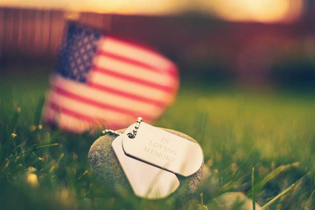 military dog tags and US flag