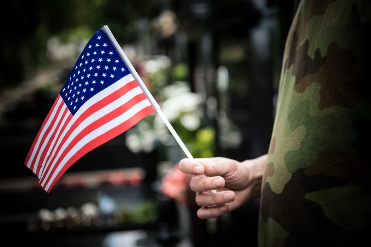 soldier holding flag