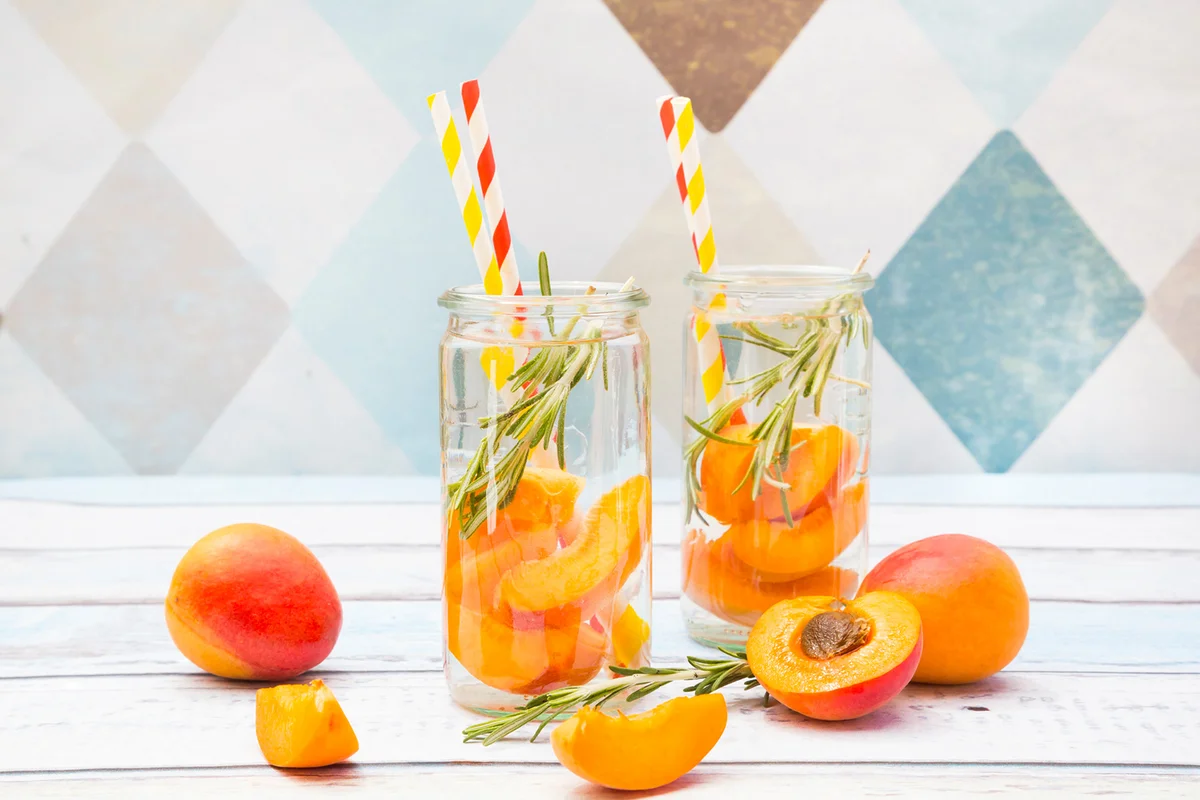 Apricot cocktail with apricot and rosemary