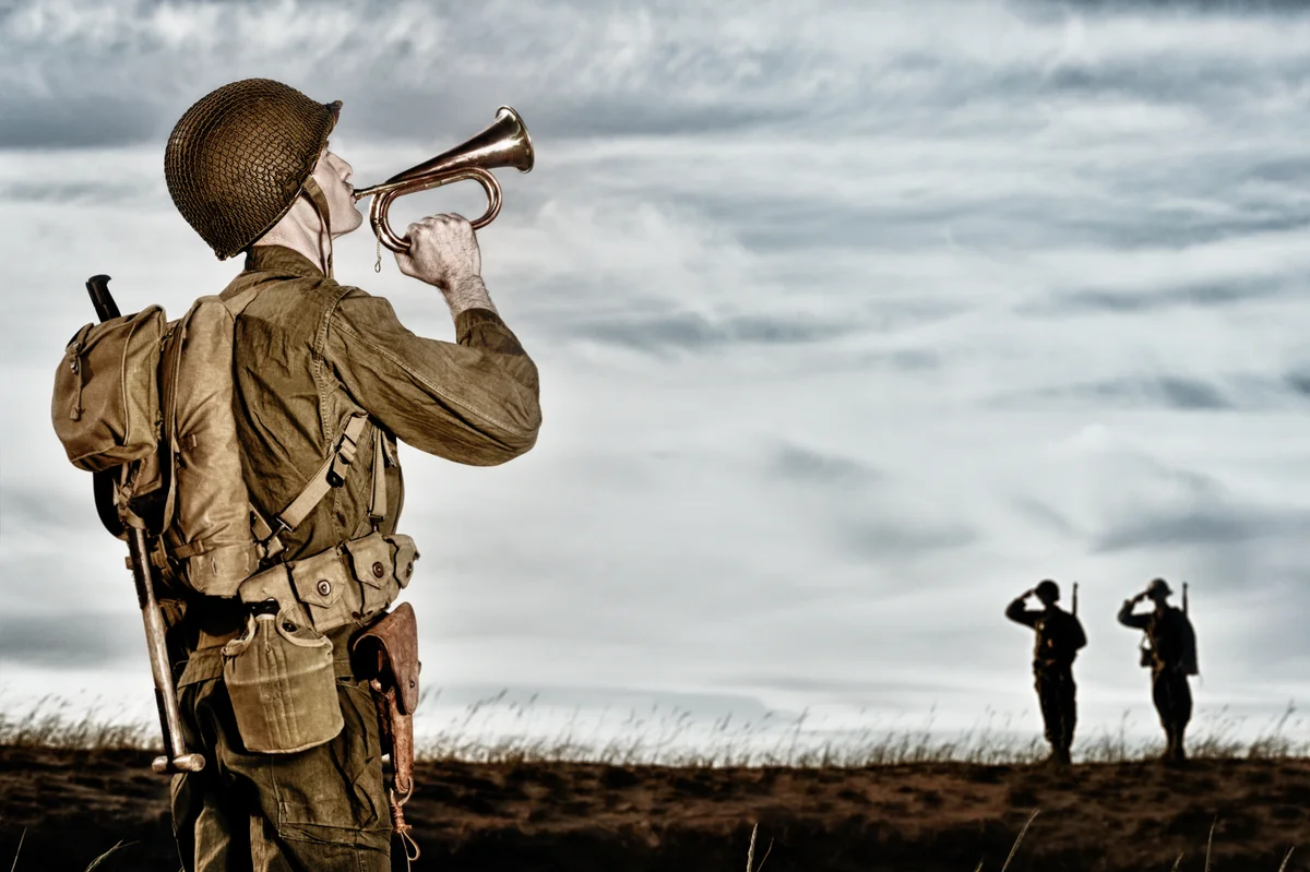 soldier playing taps