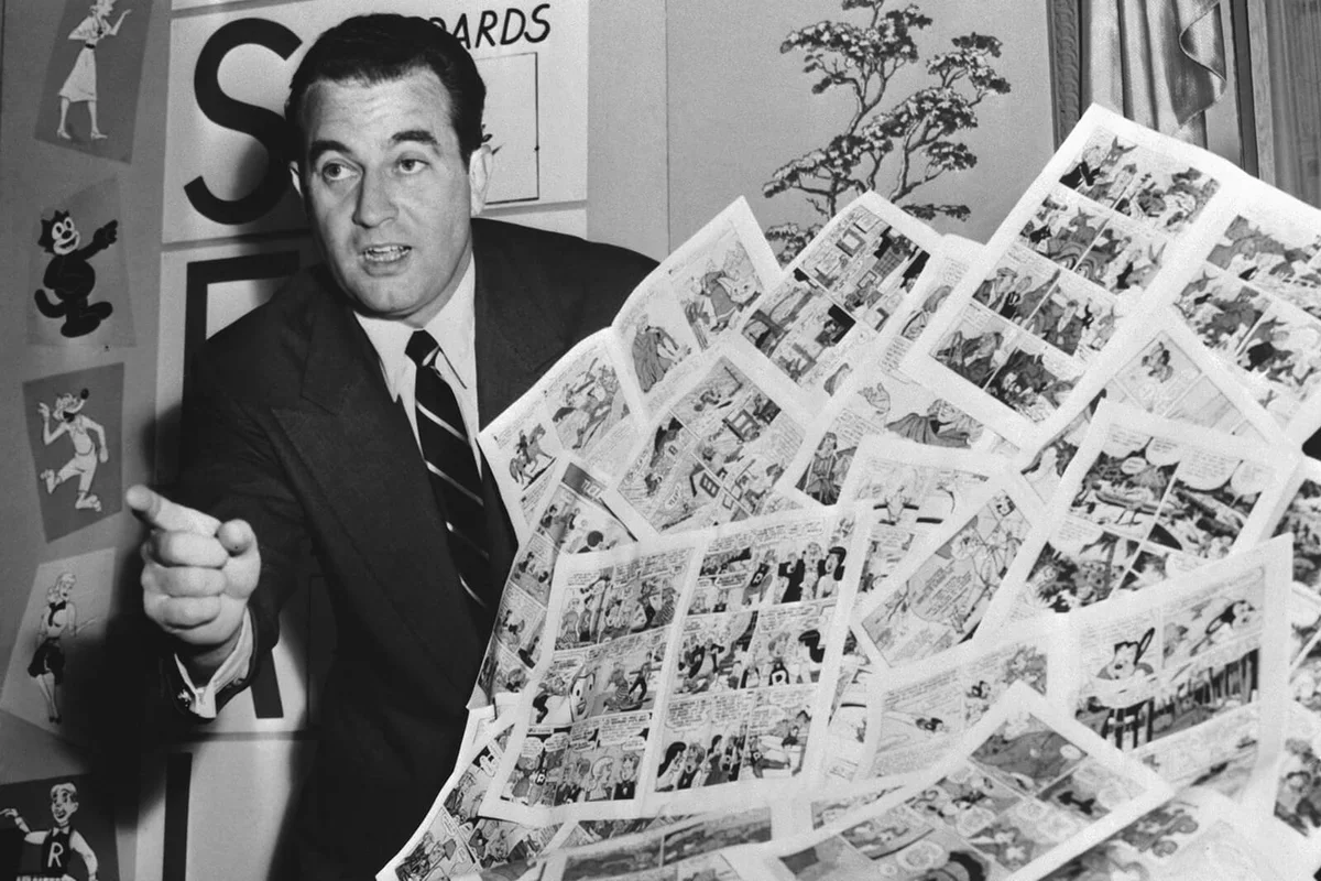 Charles F. Murphy Discussing Comic Books Display | Getty Editorial Use