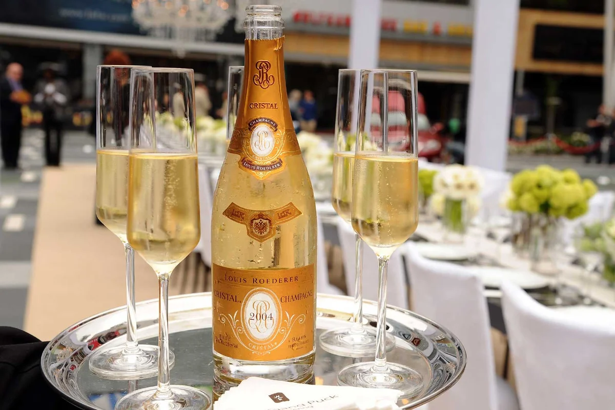 Cristal champagne on tray with glasses