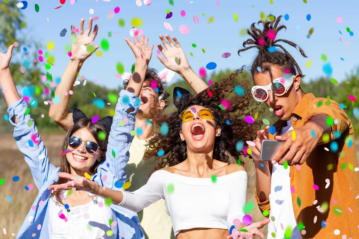 Young friends enjoying summer time together celebrating at Birthday Party