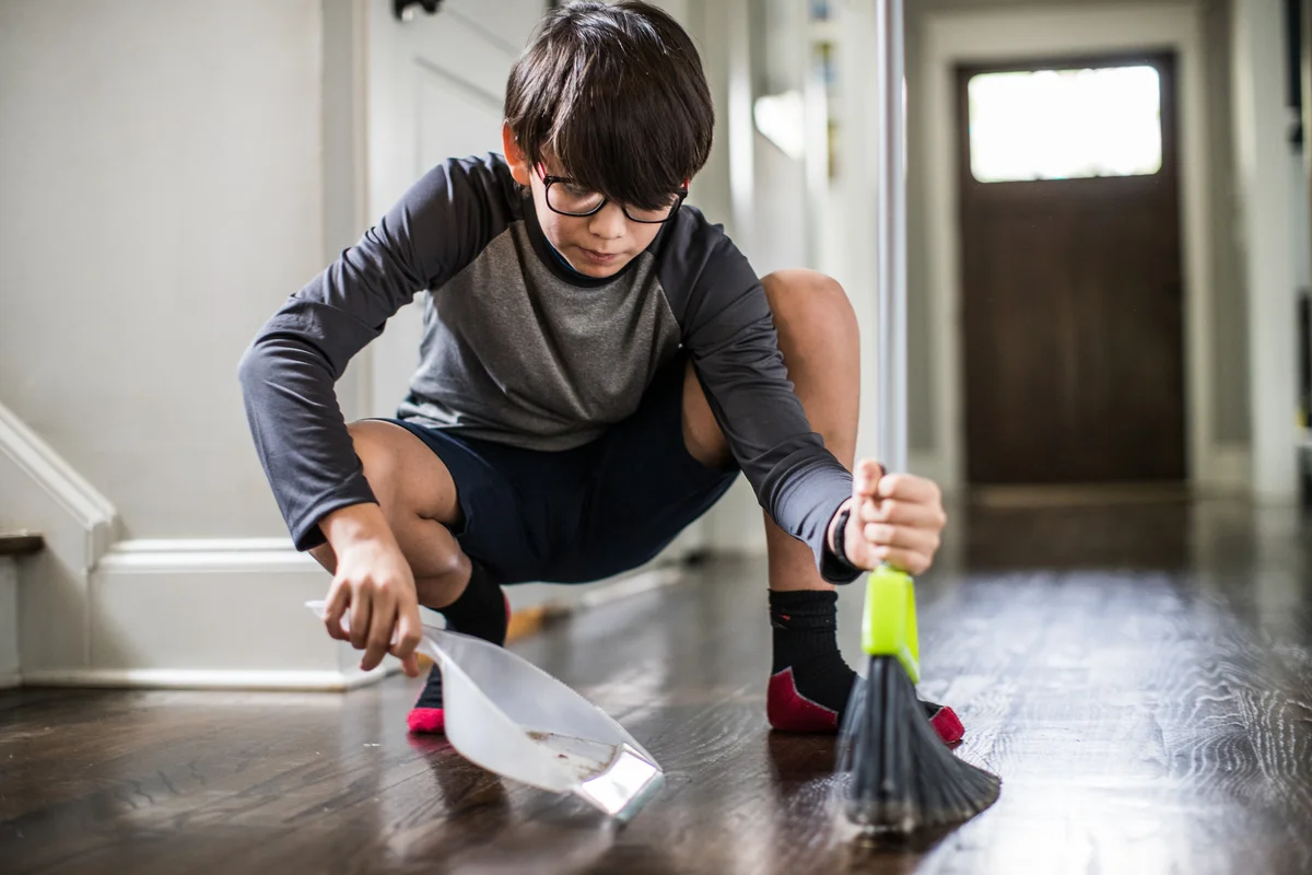 boy doing chores