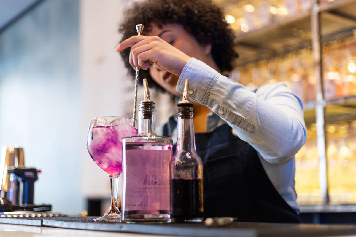 Barwoman Preparing Grateful Dead Drink