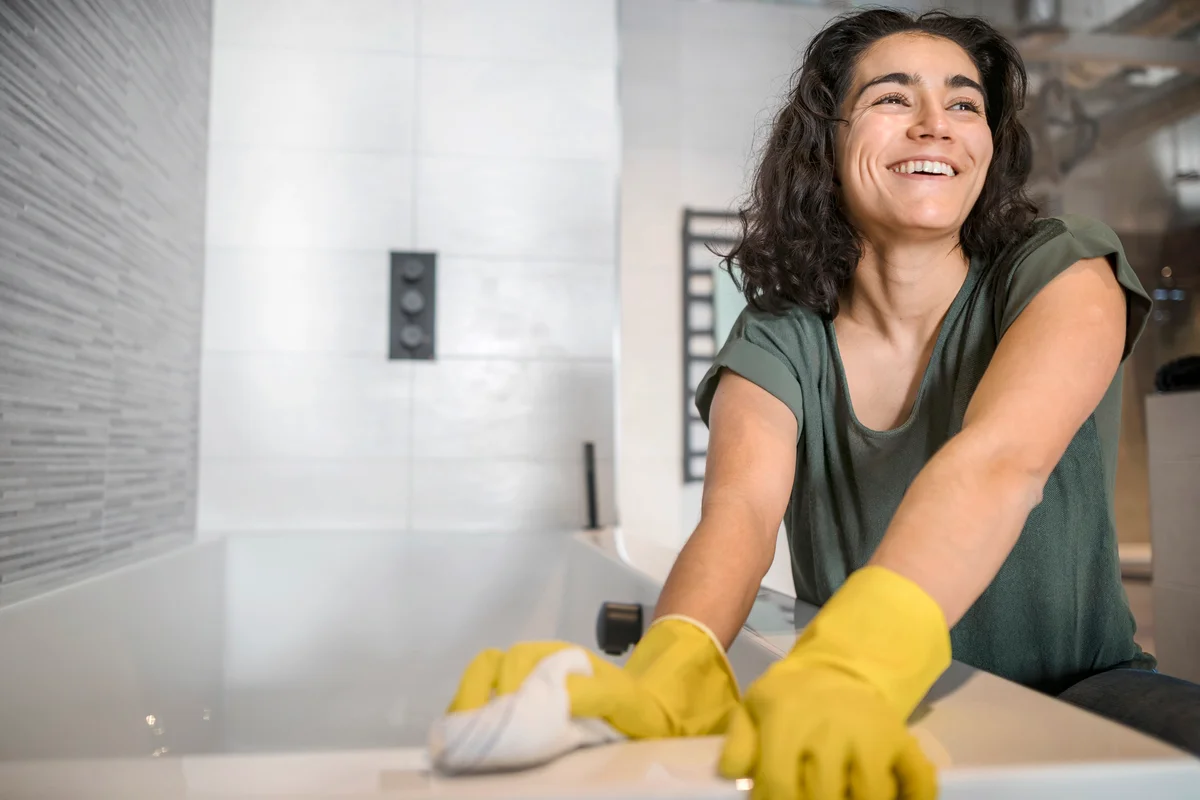 Woman cleaning her bathroom