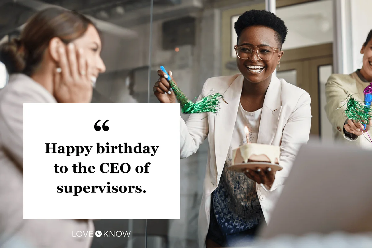 Happy businesswomen surprising their colleague for her Birthday in the office