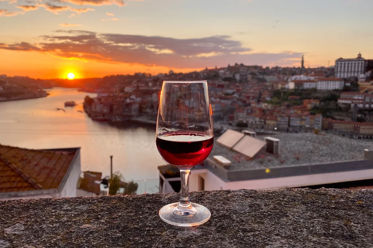 glass of red view on the observation deck with a sunset view
