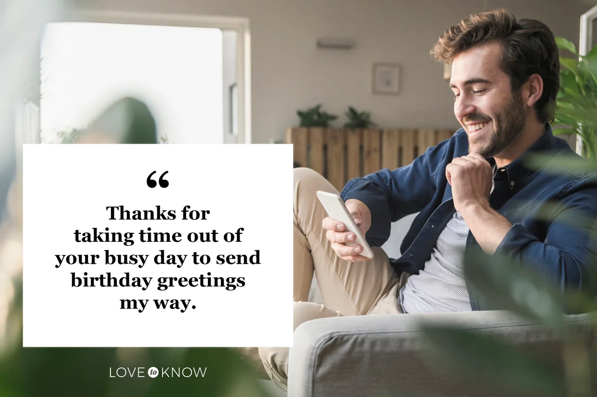 young man reading thoughtful social media birthday comments on phone