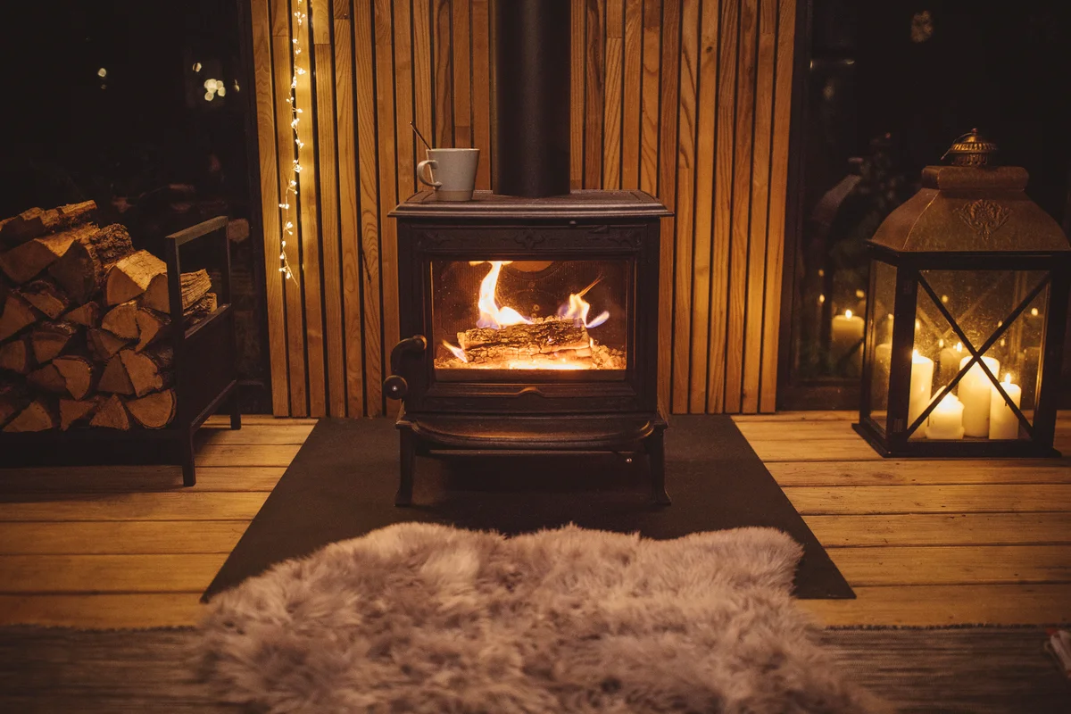 Cozy living room winter interior with fireplace