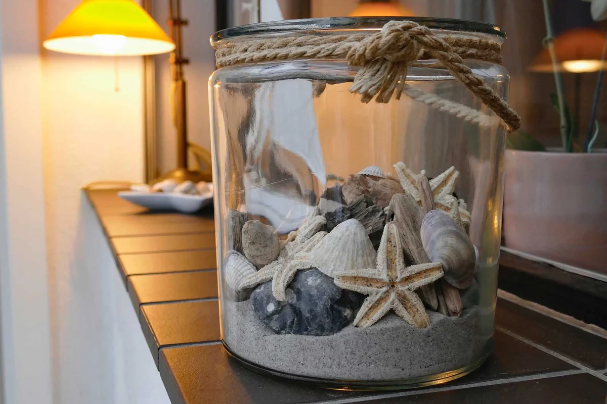 beach in a jar craft with sand and shells