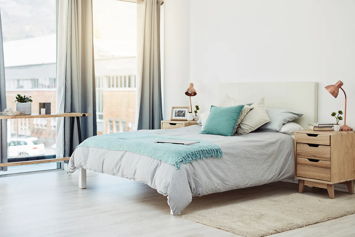 Cropped shot of an empty and neatly arranged bedroom at home during the day