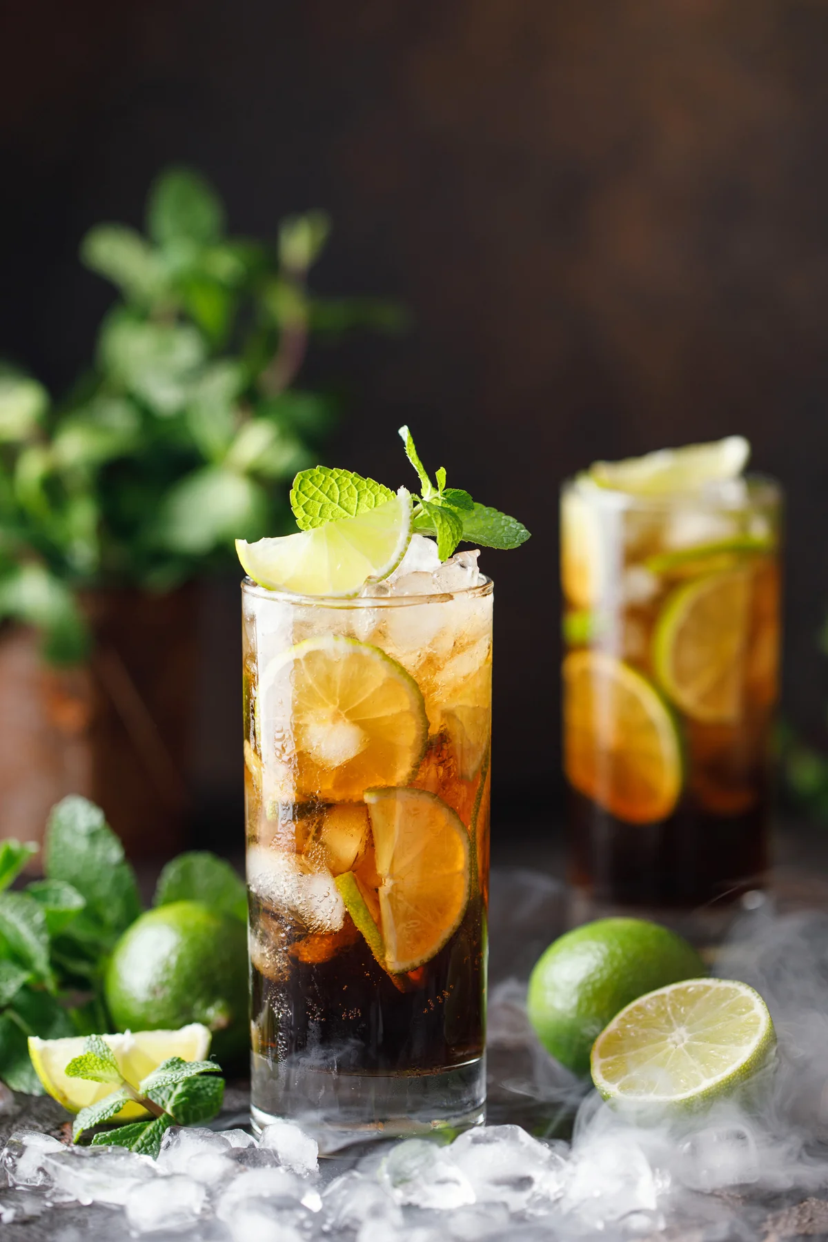 Cuba Libre with brown rum,cola,mint and lime