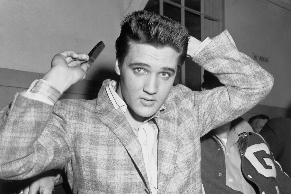 Elvis Presley Combing His Hair | Getty Editorial Use