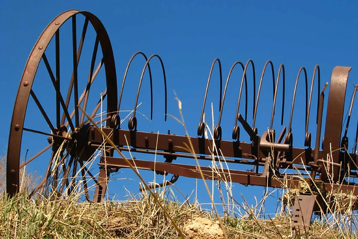 old metal hay rake