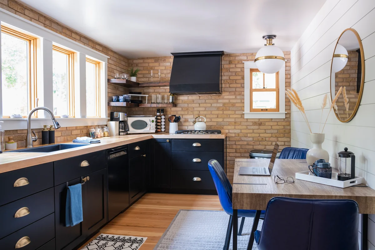 kitchen with black cabinets