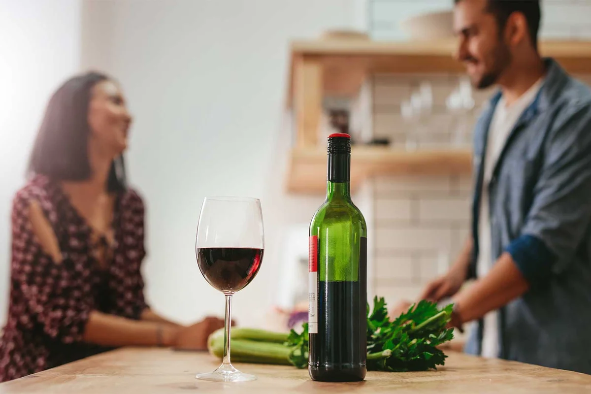 half full wine bottle on counter in kitchen